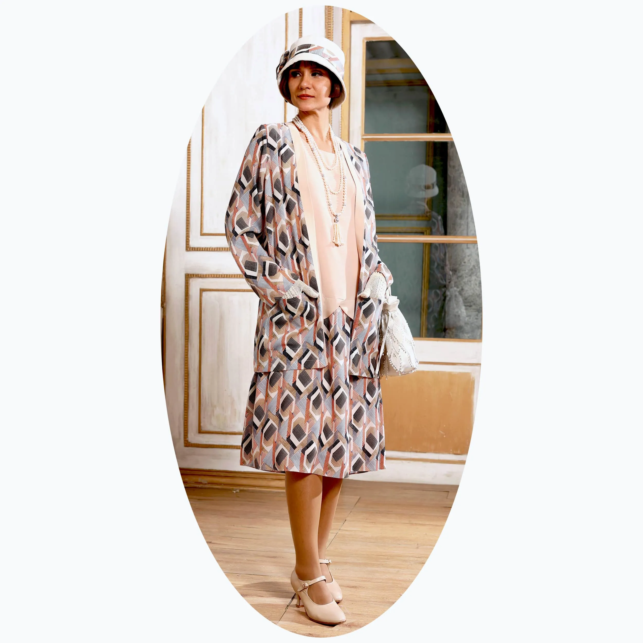 1920s Cloche hat with off-white cotton and printed amunzen ribbon