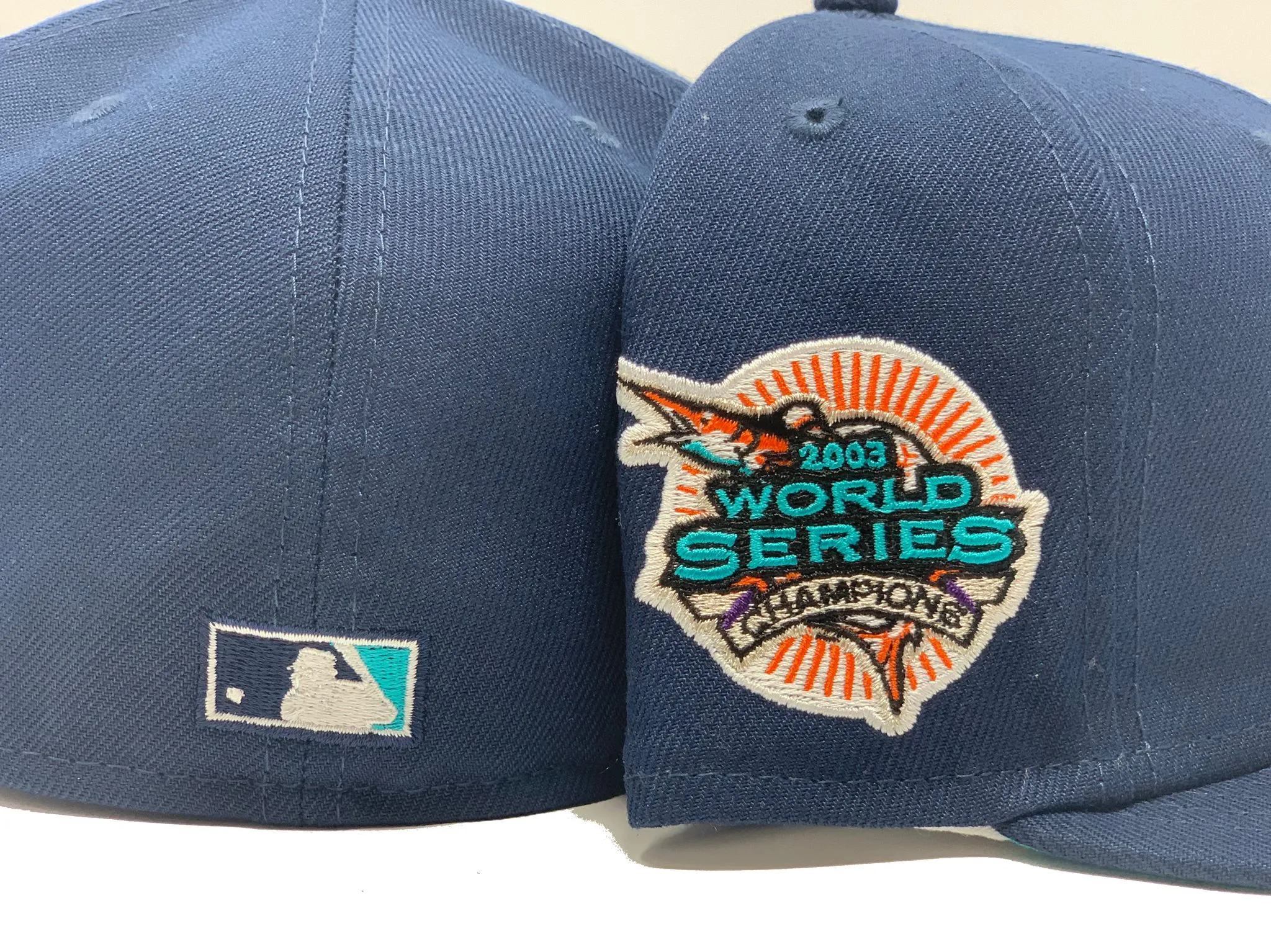 FLORIDA MARLINS 2003 WORLD SERIES CHAMPIONS LIGHT NAVY TEAL BRIM NEW ERA FITTED HAT