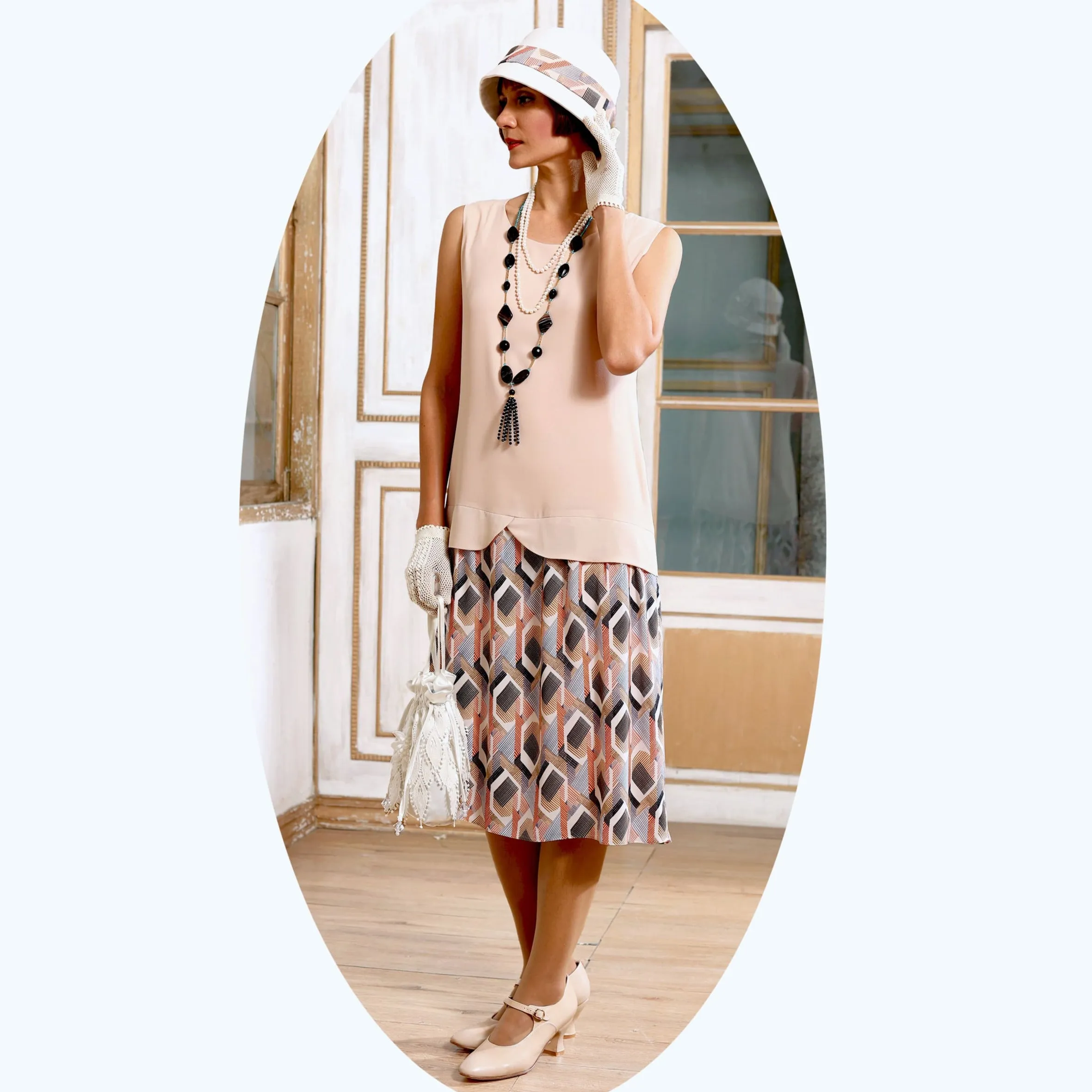 Vintage inspired 1920s dress with nude and printed skirt