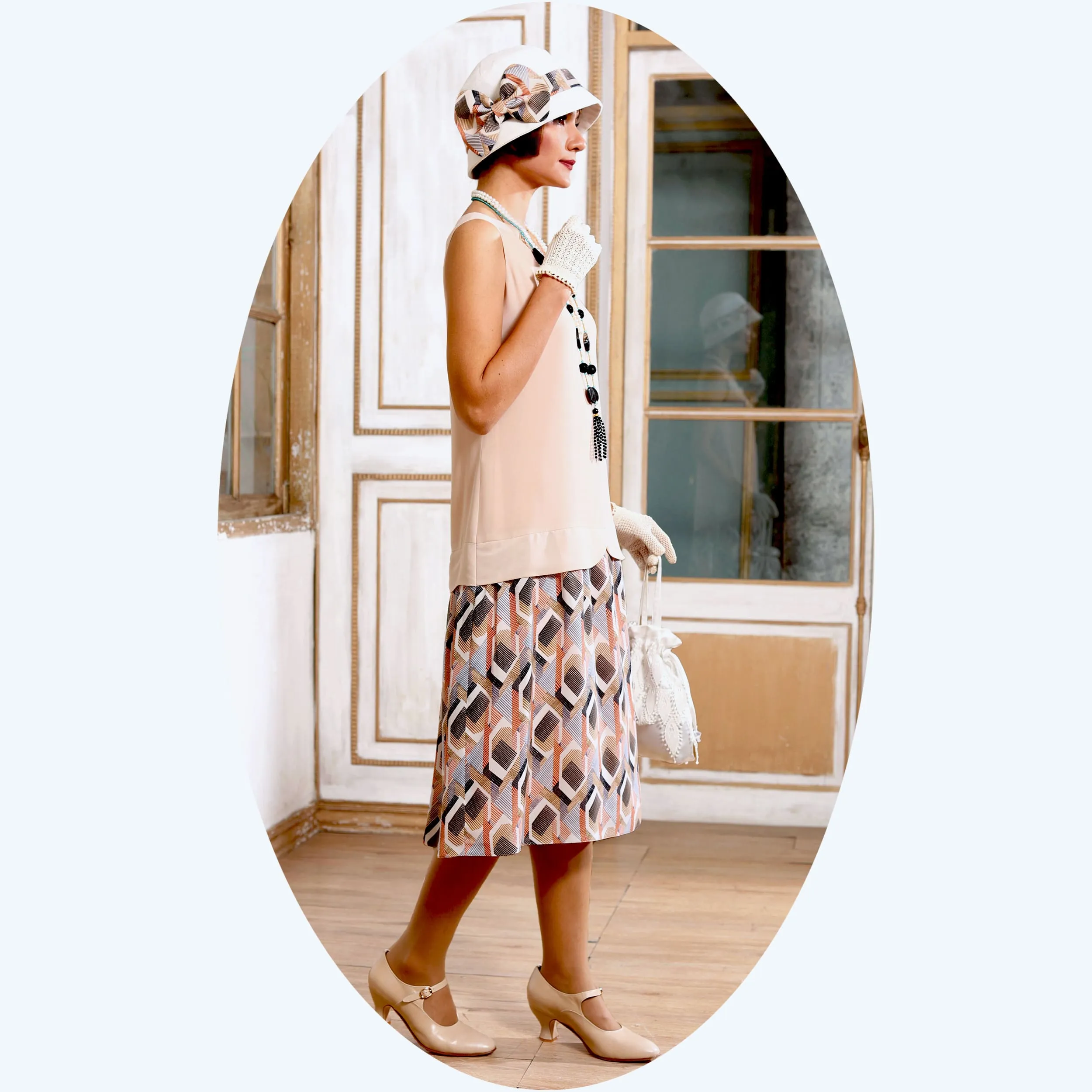 Vintage inspired 1920s dress with nude and printed skirt